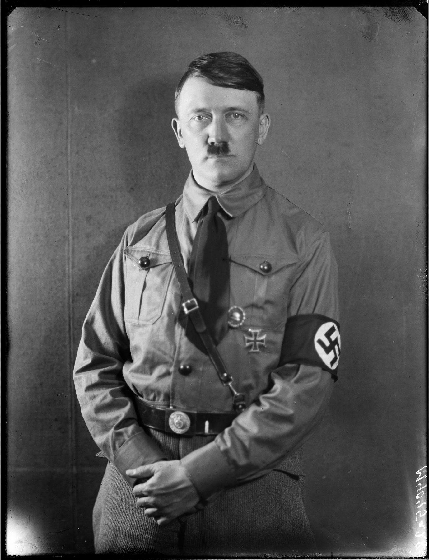 Portrait from a series a pictures taken in Heinrich Hoffman's studio in Munich, showing Adolf Hitler in SA uniform (approximate date)